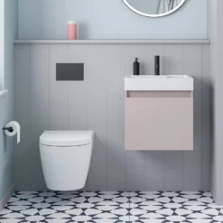 Minnie 500mm Wall Mounted 1 Door Vanity Unit & Polymarble Basin - Blush Pink 10 Minnie 500mm Wall Mounted 1 Door Vanity Unit & Polymarble Basin - Blush Pink -Vado Shop drench minnie blush pink standard cloakroom wallhung vanity unit lifestyle