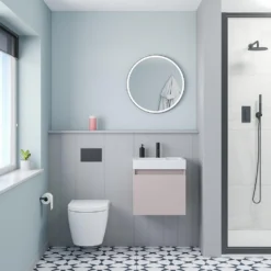 Minnie 500mm Wall Mounted 1 Door Vanity Unit & Polymarble Basin - Blush Pink 11 Minnie 500mm Wall Mounted 1 Door Vanity Unit & Polymarble Basin - Blush Pink -Vado Shop drench minnie blush pink standard cloakroom wallhung vanity unit lifestyle1