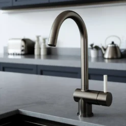 The Tap Factory Vibrance 1 Gunmetal Single Lever Mono Kitchen Mixer With Post Box Red Handle -Vado Shop tap factory vibrance 1 gunmetal with ivory handle lifestyle