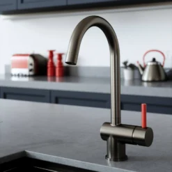 The Tap Factory Vibrance 1 Gunmetal Single Lever Mono Kitchen Mixer With Post Box Red Handle -Vado Shop tap factory vibrance 1 gunmetal with red handle lifestyle